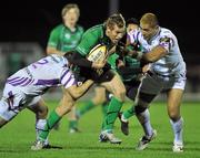 19 November 2010; Gavin Duffy, Connacht,is tackled by Jerry Collins, right, and Mefin Davis, Ospreys. Celtic League, Connacht v Ospreys, Sportsground, Galway. Picture credit: David Maher / SPORTSFILE