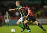 26 August 2016; Stephen Dooley of Cork City in action against Jamie Mulhall of Longford Town during the SSE Airtricity League Premier Division game between Cork City and Longford Town at Turners Cross in Cork. Photo by Eóin Noonan/Sportsfile