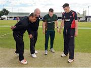 27 August 2016; Umpires Azam Ali Baig, left, and Alan Neill, join captains Dom Joyce of Merrion CC and Lee Nelson of Waringstown CC for the coin toss ahead of the Irish Cricket Senior Cup Final at Castle Avenue in Clontarf, Co. Dublin. Photo by Seb Daly/Sportsfile