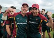 27 August 2016; Dave Langford-Smith, left, and Simon Morrissey of Merrion CC celebrate their team's victory following the Irish Cricket Senior Cup Final at Castle Avenue in Clontarf, Co. Dublin. Photo by Seb Daly/Sportsfile