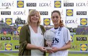 27 August 2016; LGFA President Marie Hickey presents Aisling Holton of Kildare with her player of the match trophy after the TG4 Ladies Football All-Ireland Intermediate Championship Semi-Final game between Kildare and Sligo at Kingspan Breffni Park in Cavan. Photo by Piaras Ó Mídheach/Sportsfile