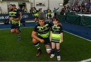26 August 2016; Bank of Ireland Leinster matchday mascot Eva Sharkey with Leinster's Ross Molony during the Pre-Season Friendly match between Leinster and Bath at Donnybrook Stadium in Donnybrook, Dublin. Photo by Stephen McCarthy/Sportsfile