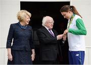 28 August 2016; Silver medal winner Annalise Murphy, right, who competed at the 2016 Rio Olympics, was amoung members of Team Ireland honoured at a special reception hosted by President Michael D. Higgins, centre, and his wife Sabina Higgins, left, in Áras an Uachtaráin, Phoenix Park, Dublin. Photo by Seb Daly/Sportsfile