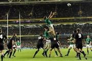 20 November 2010; Donncha O'Callaghan, Ireland, with help from team mates Devin Toner and Stephen Ferris, right, takes the ball in the lineout against New Zealand. Autumn International, Ireland v New Zealand, Aviva Stadium, Lansdowne Road, Dublin. Picture credit: Matt Browne / SPORTSFILE
