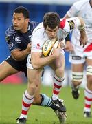 21 November 2010; Ian Whitten, Ulster, is tackled by Casey Laulala, Cardiff Blues. Celtic League, Cardiff Blues v Ulster, Cardiff City Stadium, Cardiff, Wales. Picture credit: Steve Pope / SPORTSFILE