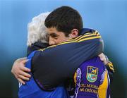 21 November 2010; Kilmacud Crokes manager Paddy Carr embraces Rory O'Carroll at the final whistle. AIB GAA Football Leinster Club Senior Championship Semi-Final, Kilmacud Crokes v Garrycastle, Parnell Park, Dublin. Picture credit: Stephen McCarthy / SPORTSFILE