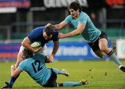 21 November 2010; Dave Campbell, St Marys College, is tackled by Dave McSharry, 12, and Shane Grannell, UCD. Leinster Senior League Cup Final, St Marys College v UCD, Donnybrook Stadium, Donnybrook, Dublin. Picture credit: Ray Lohan / SPORTSFILE