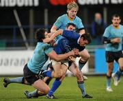 21 November 2010; Colm McMahon, St Marys College, is tackled by Shane Grannell, Shane O'Meara and Richie Bent, UCD. Leinster Senior League Cup Final, St Marys College v UCD, Donnybrook Stadium, Donnybrook, Dublin. Picture credit: Ray Lohan / SPORTSFILE