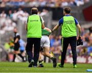 28 August 2016; Peter Crowley of Kerry is held back by team doctor Mike Finnerty, left, and physio John Sugrue after a clash with Kevin McManamon of Dublin during the GAA Football All-Ireland Senior Championship Semi-Final game between Dublin and Kerry at Croke Park in Dublin. Photo by Brendan Moran/Sportsfile