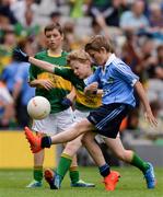 28 August 2016; Liam Osbourne, St Finnian's NS, Dunleer, Louth, representing Dublin, in action against Patrick Magee, St Colmban's, Belcoo, Fermanagh, representing Kerry, during the INTO Cumann na mBunscol GAA Respect Exhibition Go Games at the GAA Football All-Ireland Senior Championship Semi-Final game between Dublin and Kerry at Croke Park in Dublin. Photo by Piaras Ó Mídheach/Sportsfile