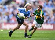28 August 2016; Ava Cornally, Tubber NS, Moate, Westmeath, representing Dublin, in action against Aoife Mulkern, Lisnagry, NS, Lisnagry, Limerick, representing Kerry, during the INTO Cumann na mBunscol GAA Respect Exhibition Go Games at the GAA Football All-Ireland Senior Championship Semi-Final game between Dublin and Kerry at Croke Park in Dublin. Photo by Stephen McCarthy/Sportsfile