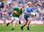 28 August 2016; Ava Cornally, Tubber NS, Moate, Westmeath, representing Dublin, in action against Aoife Mulkern, Lisnagry, NS, Lisnagry, Limerick, representing Kerry, during the INTO Cumann na mBunscol GAA Respect Exhibition Go Games at the GAA Football All-Ireland Senior Championship Semi-Final game between Dublin and Kerry at Croke Park in Dublin. Photo by Stephen McCarthy/Sportsfile