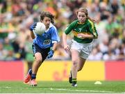 28 August 2016; Jayne Merren, St Laurence's NS, Kindlestown, Wicklow, representing Dublin, in action against Aisling Ní Ainiféin, Gaelscoil Mhic Easmainn, Tralee, Kerry, during the INTO Cumann na mBunscol GAA Respect Exhibition Go Games at the GAA Football All-Ireland Senior Championship Semi-Final game between Dublin and Kerry at Croke Park in Dublin. Photo by Stephen McCarthy/Sportsfile