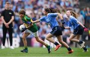 28 August 2016; Aoife Mulkern, Lisnagry, NS, Lisnagry, Limerick, representing Kerry, in action against Sinéad O'Connor, Knockanean NS, Ennis, Clare, representing Dublin, during the INTO Cumann na mBunscol GAA Respect Exhibition Go Games at the GAA Football All-Ireland Senior Championship Semi-Final game between Dublin and Kerry at Croke Park in Dublin. Photo by Stephen McCarthy/Sportsfile