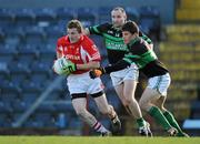 21 November 2010; John Hearne, Stradbally, in action against Sean O'Brien, 14, and Barry O'Driscoll, Nemo Rangers. AIB GAA Football Munster Club Senior Championship Semi-Final, Nemo Rangers v Stradbally, Pairc Ui Rinn, Cork. Picture credit: Brendan Moran / SPORTSFILE