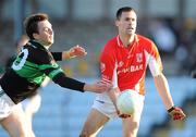 21 November 2010; John Coffey, Stradbally, in action against Paul Kerrigan, Nemo Rangers. AIB GAA Football Munster Club Senior Championship Semi-Final, Nemo Rangers v Stradbally, Pairc Ui Rinn, Cork. Picture credit: Brendan Moran / SPORTSFILE