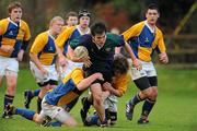 22 November 2010; Liam Walshe, East Glendalough, is tackled by Stepehen Lackey, left, and Adam Coyle, CBS Naas. Duff Cup Semi-Final, CBS Naas v East Glendalough, Old Wesley RFC, Kiltiernan, Co. Dublin. Picture credit: Barry Cregg / SPORTSFILE