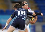 21 November 2010; BJ Botha, Ulster,is tackled by Ceri Sweeney, Cardiff Blues. Celtic League, Cardiff Blues v Ulster, Cardiff City Stadium, Cardiff, Wales. Picture credit: Steve Pope / SPORTSFILE