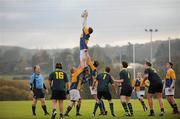 22 November 2010; Jack Hanrahan, CBS Naas, wins possession in the lin-out aided by his team-mates Johnny Kelly, left, and Adam Trundle, right. Duff Cup Semi-Final, CBS Naas v East Glendalough, Old Wesley RFC, Kiltiernan, Co. Dublin. Picture credit: Barry Cregg / SPORTSFILE