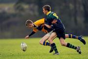 22 November 2010; Andrew Kelly, CBS Naas, is tackled by Luke Daunt Smith, East Glendalough. Duff Cup Semi-Final, CBS Naas v East Glendalough, Old Wesley RFC, Kiltiernan, Co. Dublin. Picture credit: Barry Cregg / SPORTSFILE