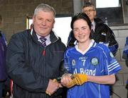 21 November 2010; Shauna Harvey, West Clare Gaels, Clare, is presented with the Player of the Match award by Martin Allen, General Manager, Tesco Nenagh. Tesco All-Ireland Intermediate Ladies Football Club Championship Final, West Clare Gaels, Clare v St Conleth's, Laois, McDonagh Park, Nenagh, Co. Tipperary. Picture credit: Diarmuid Greene / SPORTSFILE