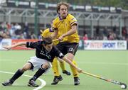 17 October 2010; David van Ass, HGC, in action against Patrick Conlon, Pembroke Wanderers. Euro Hockey League, Round 1, Pool F, HGC v Pembroke Wanderers, Hockey Club Oranje Zwart, Eindhoven, Netherlands. Picture credit: Jasper Ruhe / SPORTSFILE