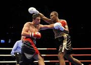 23 November 2010; Kenny Egan, Miami Gallos, left, exchange punches with Dorian Anthony, Los Angeles Matadors, during their Light-heavyweight bout. World Series Boxing - Week 1, American Airlines Arena, Miami, Florida, USA. Picture credit; SPORTSFILE