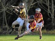 24 November 2010; Seam McDermott, Castlecomer CS, in action against Ciaran Doyle and Shane Cassin, Kilkenny CBS. Leinster Colleges Senior Hurling ‘A’ League Semi-Final, Castlecomer CS v Kilkenny CBS, Palmerstown GAA Club, Palmerstown, Co. Kilkenny. Picture credit: Matt Browne / SPORTSFILE