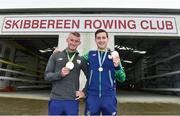 29 August 2016; Rio 2016 Olympic silver medallists in the Lightweight Double Sculls, Gary, left, and Paul O'Donovan with their medals outside the boathouse at the Skibbereen Rowing Club in Skibbereen, Co. Cork. Photo by Brendan Moran/Sportsfile