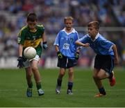 28 August 2016; Conor Sweeney, St John's NS, Ballisodare, Sligo, representing Kerry, and Luke Whitney, St Oliver Plunkett BNS, Moate, Westmeath, representing Dublin during the INTO Cumann na mBunscol GAA Respect Exhibition Go Games at the GAA Football All-Ireland Senior Championship Semi-Final game between Dublin and Kerry at Croke Park in Dublin. Photo by Ray McManus/Sportsfile