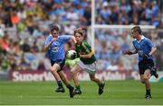 28 August 2016; Darragh O'Connell, Ovens NS, Ovens, Cork, representing Kerry, in action against Adam O'Neill, St Fiachra's Senior School, Beamount, Dublin, left, and Conor Foley, Scoil Mhuire Horeswood, New Ross, Wexford, representing Dublin, during the INTO Cumann na mBunscol GAA Respect Exhibition Go Games at the GAA Football All-Ireland Senior Championship Semi-Final game between Dublin and Kerry at Croke Park in Dublin. Photo by Ray McManus/Sportsfile