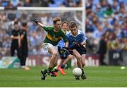 28 August 2016; Conor Foley, Scoil Mhuire Horeswood, New Ross, Wexford, representing Dublin, in action against Darragh O'Connell, Ovens NS, Ovens, Cork, representing Kerry, during the INTO Cumann na mBunscol GAA Respect Exhibition Go Games at the GAA Football All-Ireland Senior Championship Semi-Final game between Dublin and Kerry at Croke Park in Dublin. Photo by Ray McManus/Sportsfile