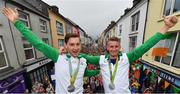 29 August 2016; Paul O'Donovan and Gary, left, as they arrive home on an open top bus through Skibbereen village after their success in the Rio 2016 Olympic Games. Photo by Brendan Moran/Sportsfile