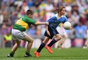 28 August 2016; Liam Osbourne, St Finnian's NS, Dunleer, Louth, representing Dublin, is tackled by TJ Carroll, Loughmore, Templemore, Tipperary, representing Kerry, in action during the INTO Cumann na mBunscol GAA Respect Exhibition Go Games at the GAA Football All-Ireland Senior Championship Semi-Final game between Dublin and Kerry at Croke Park in Dublin. Photo by Ramsey Cardy/Sportsfile