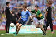 28 August 2016; Daniel Reilly, St Mary's Parish Primary School, Drogheda, Louth, representing Dublin, is tackled by TJ Carroll, Loughmore, Templemore, Tipperary, representing Kerry, in action during the INTO Cumann na mBunscol GAA Respect Exhibition Go Games at the GAA Football All-Ireland Senior Championship Semi-Final game between Dublin and Kerry at Croke Park in Dublin. Photo by Ramsey Cardy/Sportsfile
