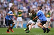 28 August 2016; Darragh O'Connell, Ovens NS, Ovens, Cork, representing Kerry, is tackled by Adam O'Neill, St Fiachra's Senior School, Beamount, Dublin, representing Dublin, in action during the INTO Cumann na mBunscol GAA Respect Exhibition Go Games at the GAA Football All-Ireland Senior Championship Semi-Final game between Dublin and Kerry at Croke Park in Dublin. Photo by Ramsey Cardy/Sportsfile