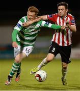 30 August 2016; Gary Shaw of Shamrock Rovers in action against Dean Jarvis of Derry City during the SSE Airtricity League Premier Division game between Shamrock Rovers and Derry City at Tallaght Stadium in Tallaght, Co Dublin. Photo by Seb Daly/Sportsfile
