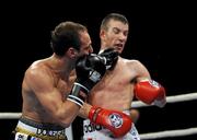 19 November 2010; Vincenzo Picardi, Thunder Milano, exchange punches with John Joe Nevin, Paris United, right, during their 54kg bout. World Series Boxing - Week 1, Palasharp, Milan, Italy. Picture credit; SPORTSFILE