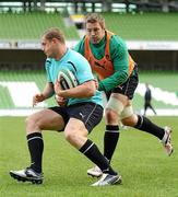 26 November 2010; Ireland's Jamie Heaslip is tackled by Sean O'Brien during squad training ahead of their Autumn International against Argentina on Sunday. Ireland Rugby Squad Training, Aviva Stadium, Lansdowne Road, Dublin. Picture credit: Stephen McCarthy / SPORTSFILE