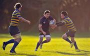 26 November 2010; Lee Deighton, Sandford Park School, in action against Aidan Sherlock, left, and Sean O'Driscoll, Skerries CC. McMullen Cup Semi-Final, Skerries CC v Sandford Park School, ALSAA, Santry, Dublin. Picture credit: David Maher / SPORTSFILE