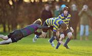 26 November 2010; Fergus Grant, Skerries CC, is tackled by James Orr, Sandford Park School. McMullen Cup Semi-Final, Skerries CC v Sandford Park School, ALSAA, Santry, Dublin. Picture credit: David Maher / SPORTSFILE