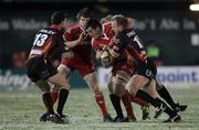 26 November 2010; Peter O'Mahony, Munster, is tackled by Ashley Smith, Dragons. Celtic League, Dragons v Munster, Rodney Parade, Newport, Wales. Picture credit: Steve Pope / SPORTSFILE