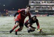 26 November 2010; Scott Deasy, Munster, and Aled Bre, Dragons, compete for a loose ball. Celtic League, Dragons v Munster, Rodney Parade, Newport, Wales. Picture credit: Steve Pope / SPORTSFILE