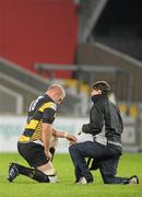 26 November 2010; Paul O'Connell, Young Munster, receives medical attention from Young Munster physio Vicky Percy. All-Ireland League Division 1, Shannon v Young Munster, Thomond Park, Limerick. Picture credit: Diarmuid Greene / SPORTSFILE