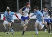 27 November 2010; Cathal O'Flaherty, Cork Constitution, gets away from Ronan O'Mahony, left, and Brian Vaughan, Garryowen. All-Ireland League Division 1, Garryowen v Cork Constitution, Dooradoyle, Limerick. Picture credit: Diarmuid Greene / SPORTSFILE