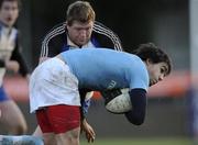 27 November 2010; Conor Murray, Garryowen, is tackled by Stephen Archer, Cork Constitution. All-Ireland League Division 1, Garryowen v Cork Constitution, Dooradoyle, Limerick. Picture credit: Diarmuid Greene / SPORTSFILE