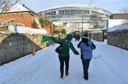 28 November 2010; An Ireland rugby supporter steadies herself on the icy ground as she makes her way down Lansdowne Lane on the way to the match. Autumn International, Ireland v Argentina, Aviva Stadium, Lansdowne Road, Dublin. Picture credit: Brian Lawless / SPORTSFILE