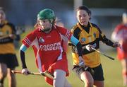 28 November 2010; Aoife Davoren, Corofin, Co. Clare, in action against Catherine Glennon, Four Roads, Co. Roscommon. All-Ireland Junior Camogie Club Championship Final, Corofin, Co. Clare v Four Roads, Co. Roscommon, Duggan Park, Ballinasloe, Co. Galway. Picture credit: Ray Ryan / SPORTSFILE