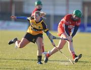 28 November 2010; Edel Keating, Corofin, Co. Clare, in action against Niamh Coyle, Four Roads, Co. Roscommon. All-Ireland Junior Camogie Club Championship Final, Corofin, Co. Clare v Four Roads, Co. Roscommon, Duggan Park, Ballinasloe, Co. Galway. Picture credit: Ray Ryan / SPORTSFILE