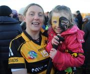 28 November 2010;  Cait Kenny, Four Roads, Co. Roscommon holds her 3 year old daughter Debra. All-Ireland Junior Camogie Club Championship Final, Corofin, Co. Clare v Four Roads, Co. Roscommon, Duggan Park, Ballinasloe, Co. Galway. Picture credit: Ray Ryan / SPORTSFILE